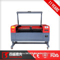 portable laser cutter for cloth and garments and shoes model in a low price co2 laser cutting engraving machine